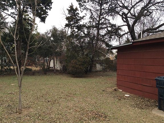 Back of historic home, treed lot