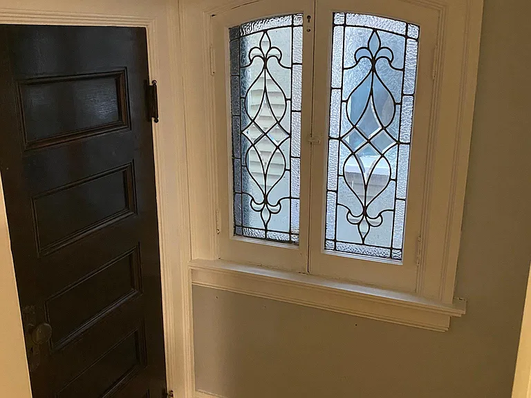 Small Coat Closet and Window