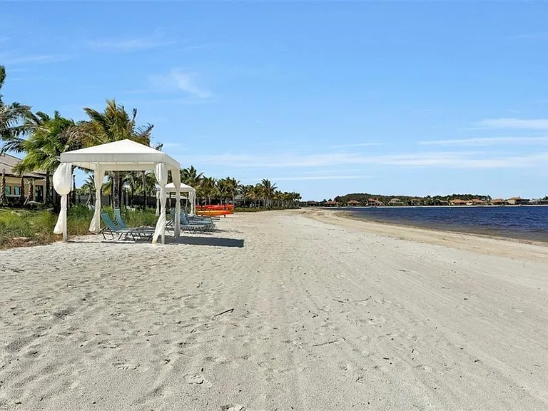Relax on a nice sandy beach right in your community!