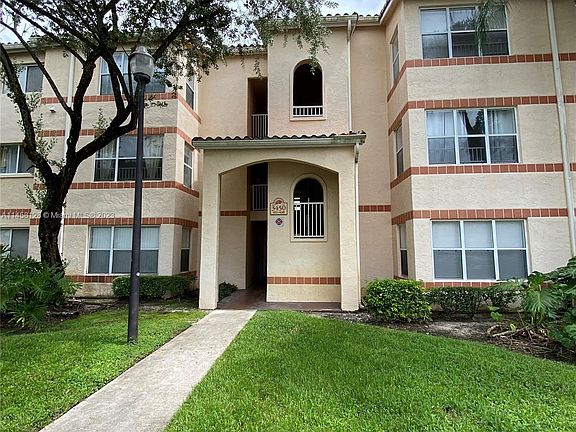 2nd image of 3450 Pinewalk Dr N APT 432