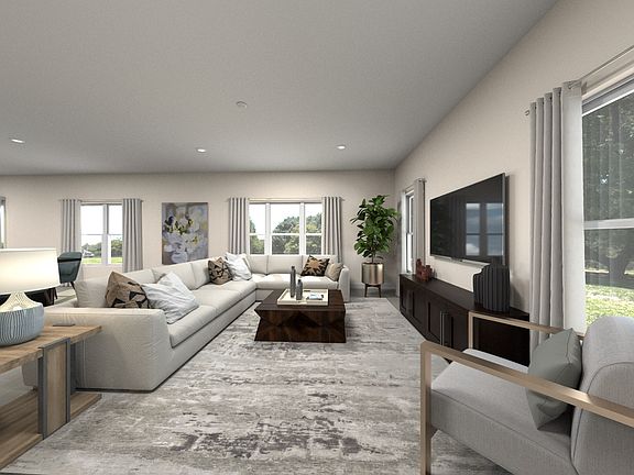 Residence 4 living room staged at a nearby Meritage community.