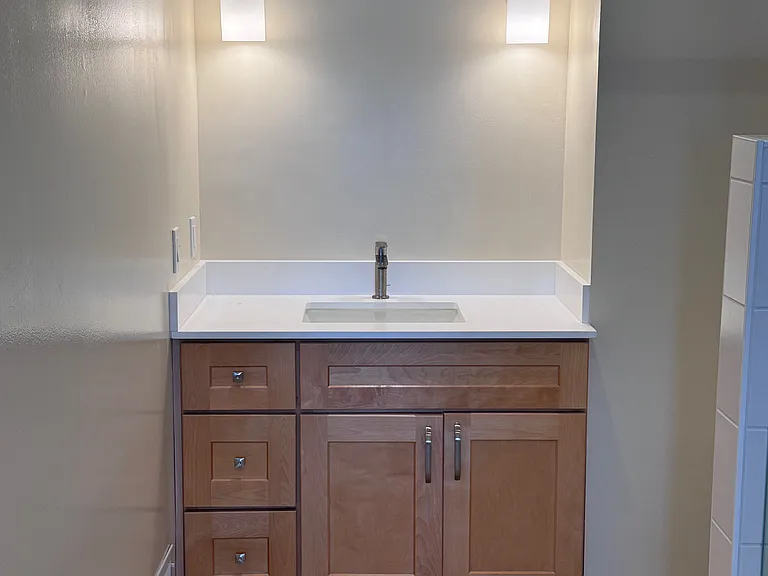 Newly remodeled. Will hang mirror and fixtures.