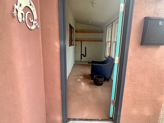 entrance and sunroom where washer/dryer is located