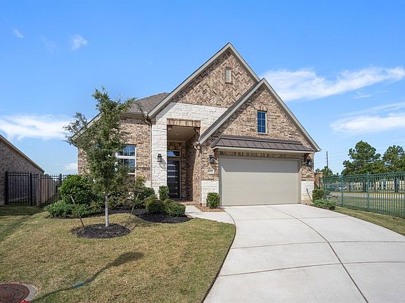 Beautiful 1.5 story Patio SMART HOME, stacked stone & stucco elevation. Dual wide driveway! This pristine home is Like New and has all you would desire.