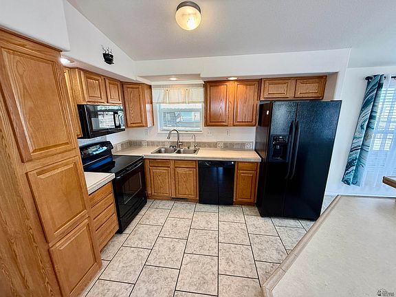 4th image of 13239 E 48th Dr