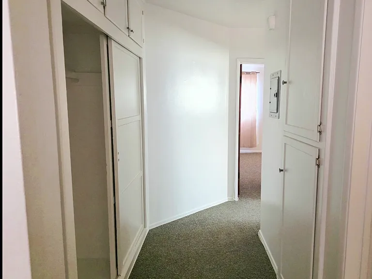 Hallway with lots of storage space.