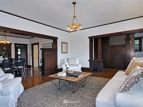 Living room with view of dining room and entryway