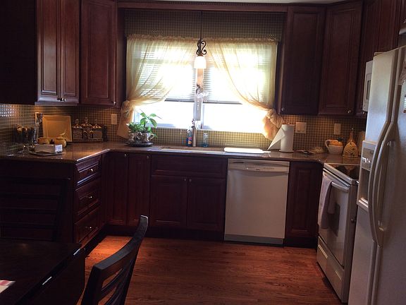 Cherrywood cabinets.