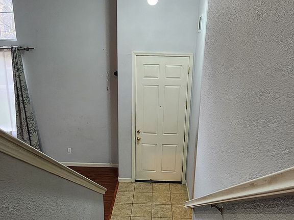 Stairs to Open Floor plan for - Family / Kitchen & Dining Area