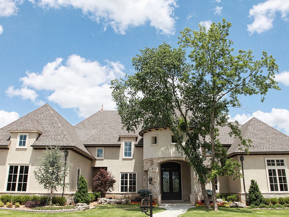 Estate Home in The Tradition.  Stucco and Stone Exterior.