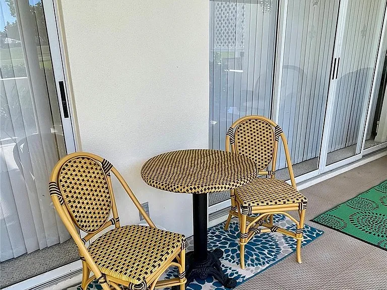 Cafe table in Screened Lanai