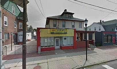 Left half of this building is ours, downstairs is the restaurant and upstairs are the apartments.