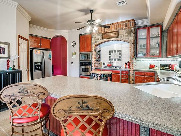 Another view of the kitchen and door to pantry.