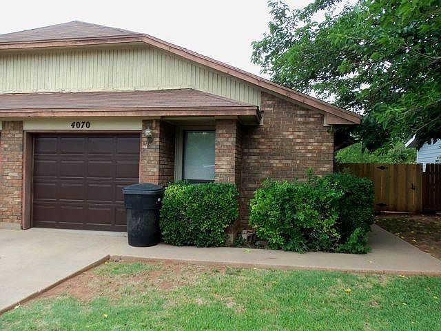 1 CAR GARAGE WITH REMOTE OPENER! BRICK EXTERIOR MEANS SMALL UTILITY BILLS!