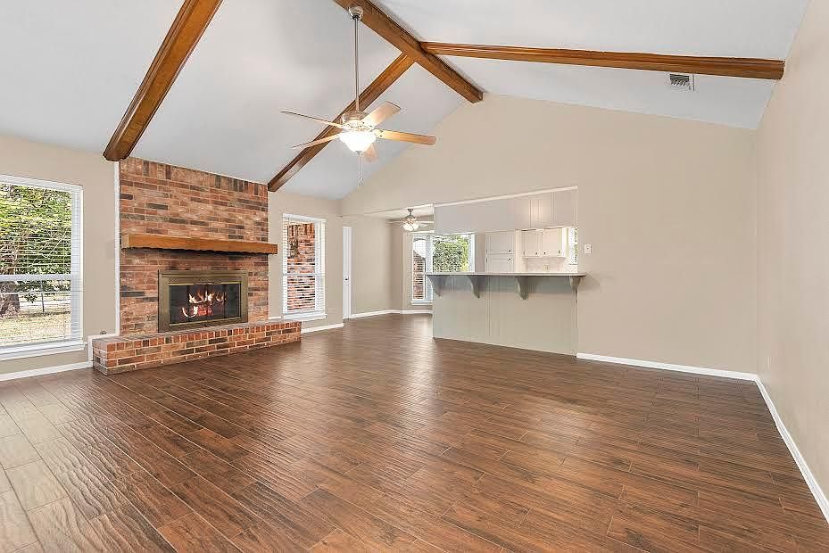 Spacious living room with a cozy fireplace