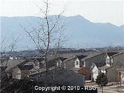 There is a view of mountains from the front yard, the kitchen, front bedroom.