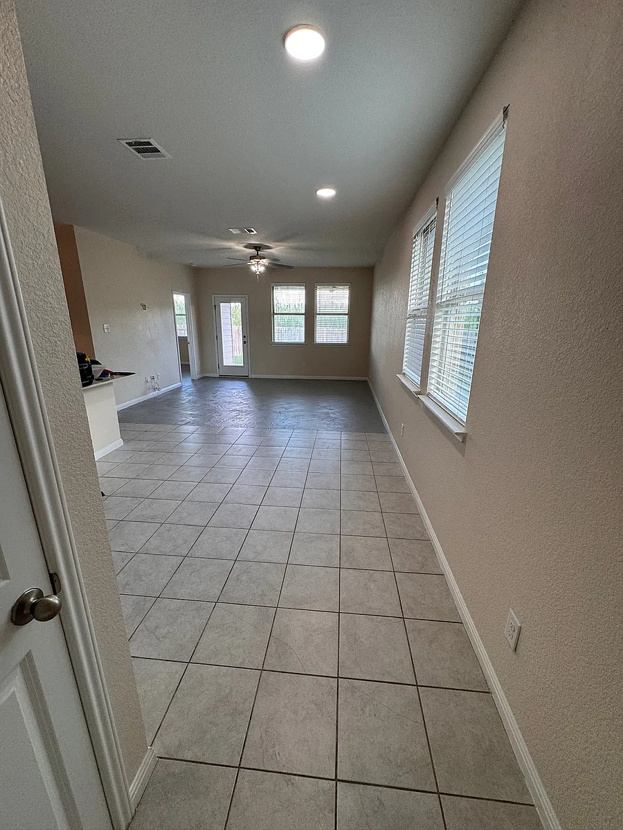 Tile and Stained concrete throughout. No Carpet! - 14013 Fallsprings Way