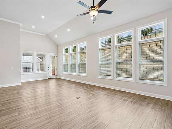 Family Room featuring vaulted ceiling