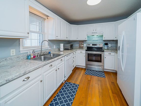 Kitchen is right off side entrance of house.