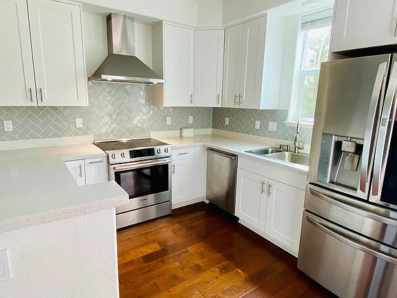 Modern kitchen with stainless steel upgraded appliances