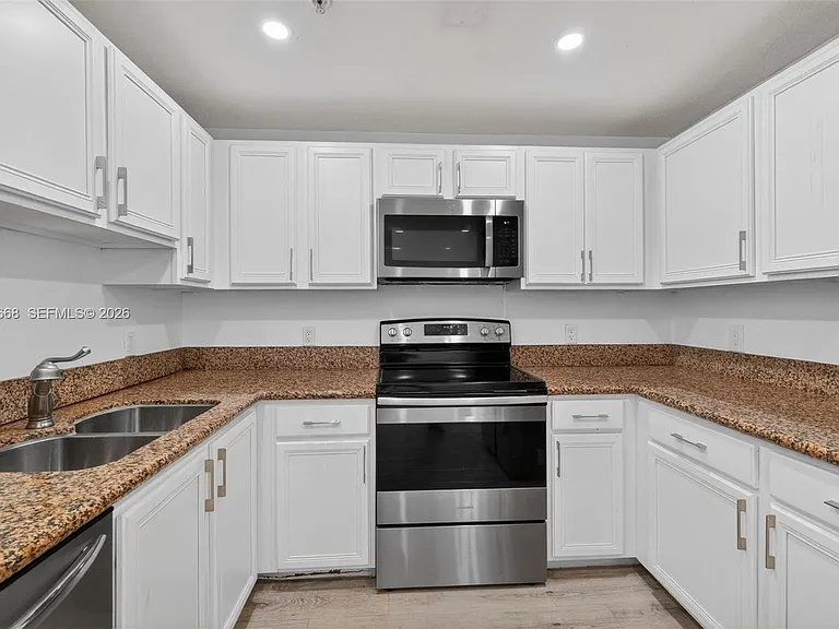 5271 SW 8th St #305 — Photo 7