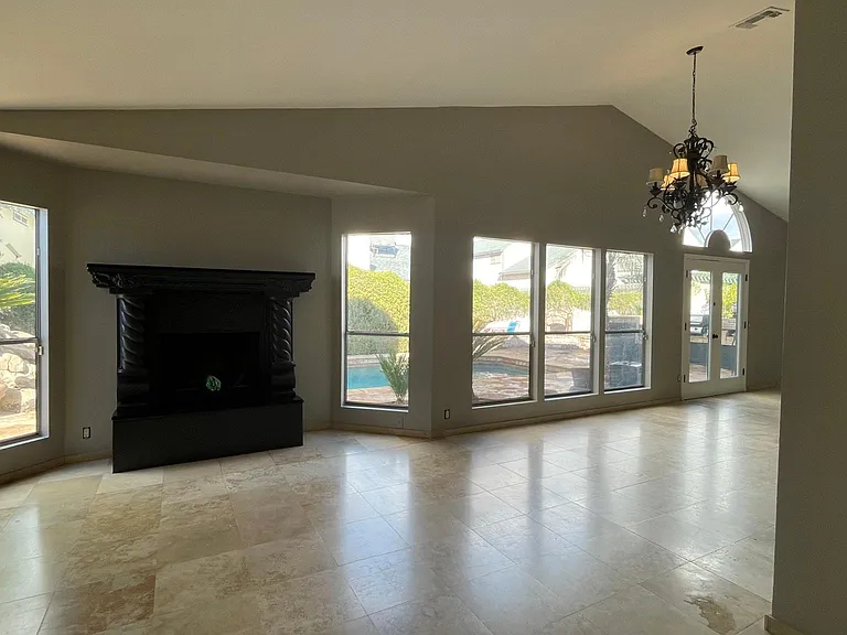 UNFURNISHED. View from the TV room, looking into the dining room.