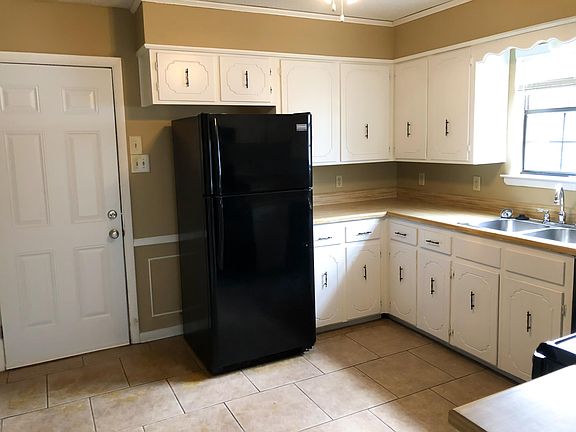 complete with refrigerator/freezer.