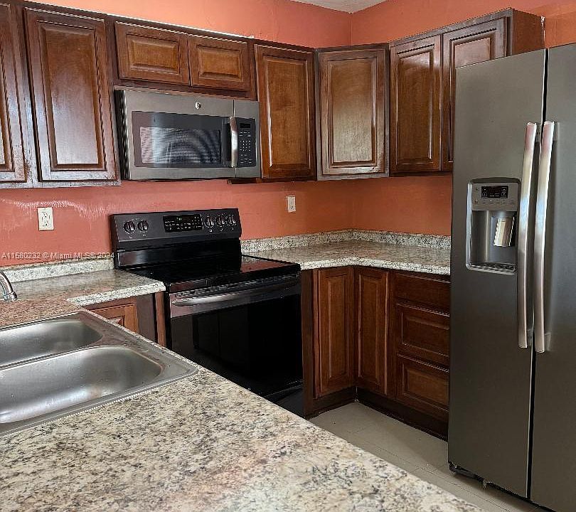 1st image of 447 NE 210th Circle Ter APT 102-20
