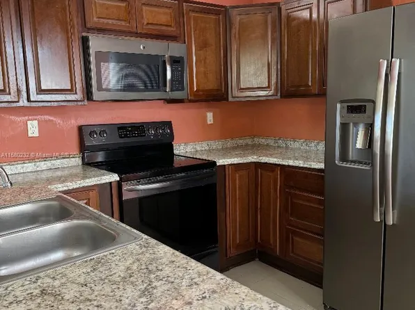 447 NE 210th Circle Ter APT 102-20, Miami, FL 33179