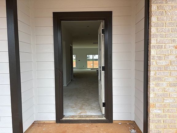 Exterior - Earthy textures and warm tones feel rooted in place.