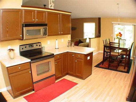 View of updated Kitchen open to Breakfast Area.