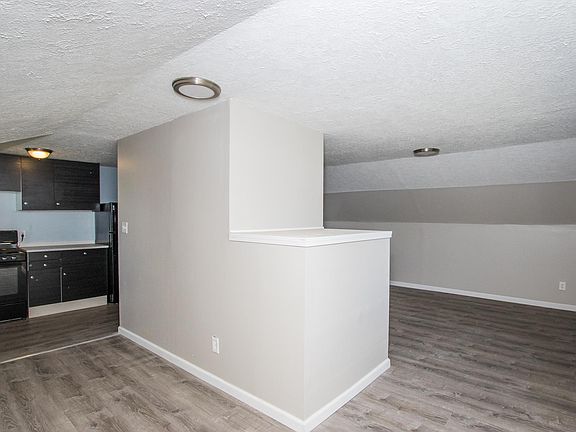 Living room, dining and kitchen area