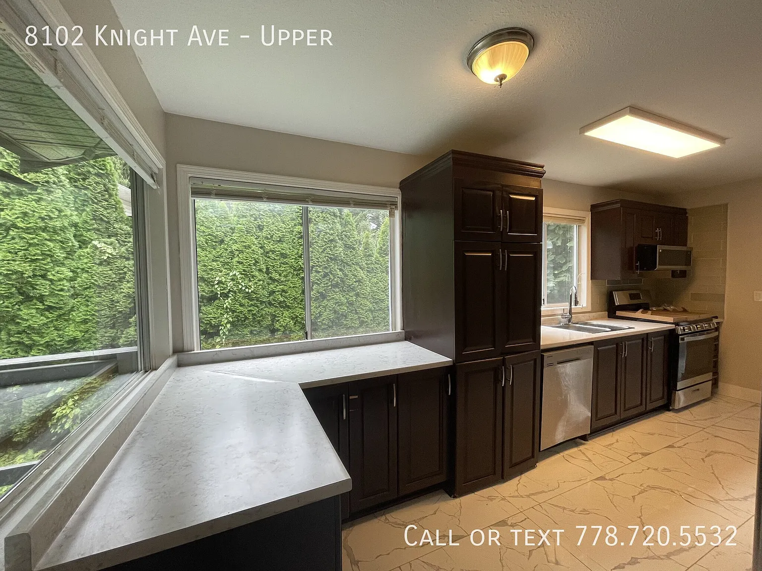 Upper Suite with 3 Bedrooms plus Den and 2 Baths — Photo 4