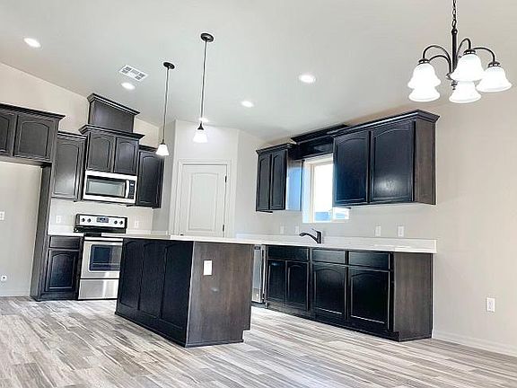 5th image of 12576 E 49th St