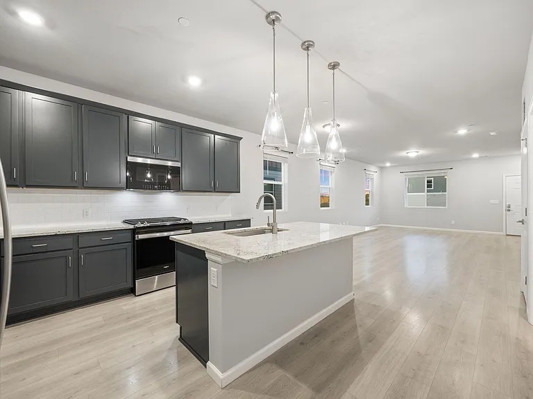 Beautiful kitchen with island seating and all stainless appliances