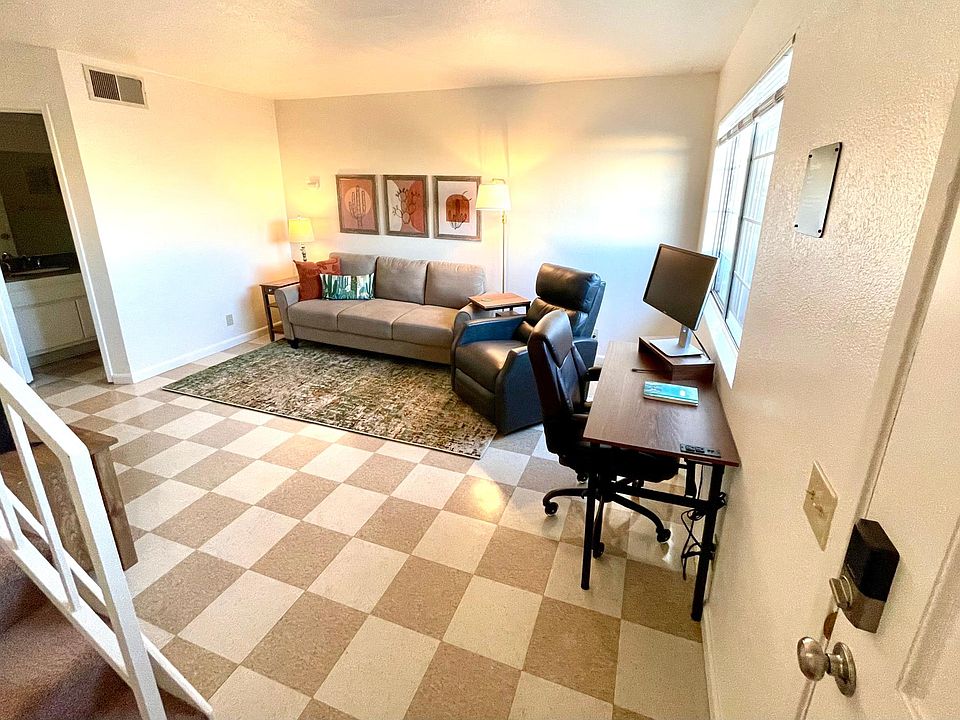 Living room. Workspace is portable and can be relocated to a bedroom if needed