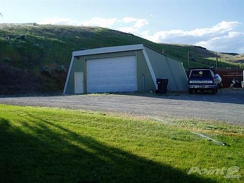 Shed off to the right of house