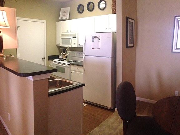 Spacious kitchen & Laundry room with full size washer/dryer