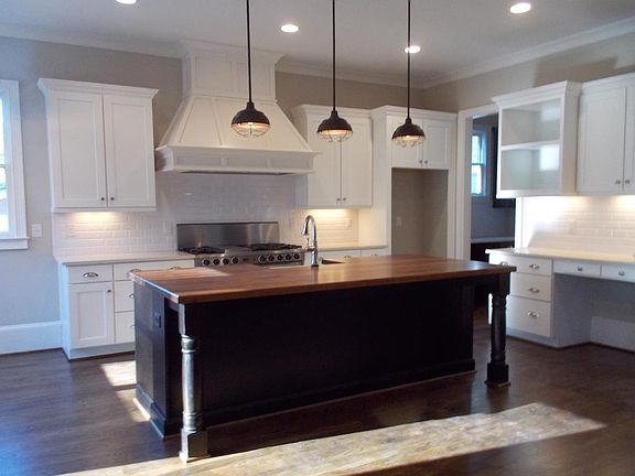 chef's kitchen with stunning island