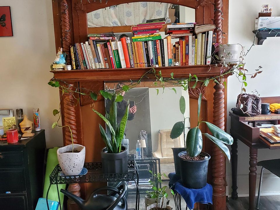 Original wooden fireplace mantle in great room