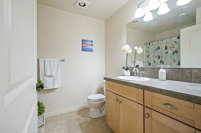 7907 NE Rockne Way — Photo 15