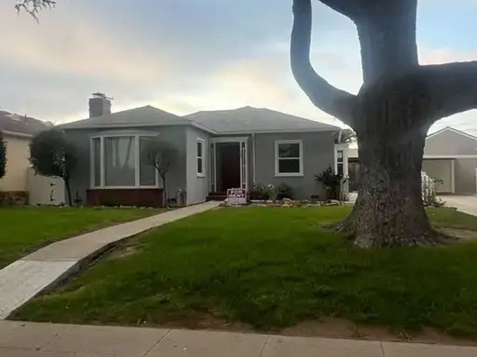 Beautiful Front yard in a tree lined street.