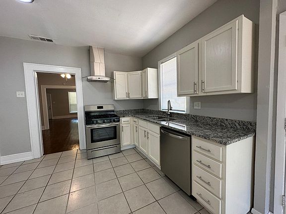 Stainless steel appliances and granite countertop
