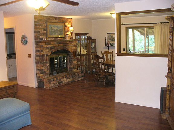 Front Door Entry
						:
						Front Door enters into Living Room with NEW Pergo wood floors.