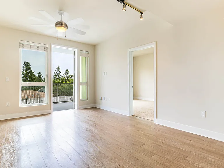 Living Room with Balcony and Hard Surface Flooring
