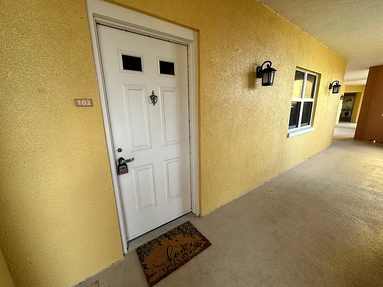 611 Riviera Dunes Way #102 — Photo 3