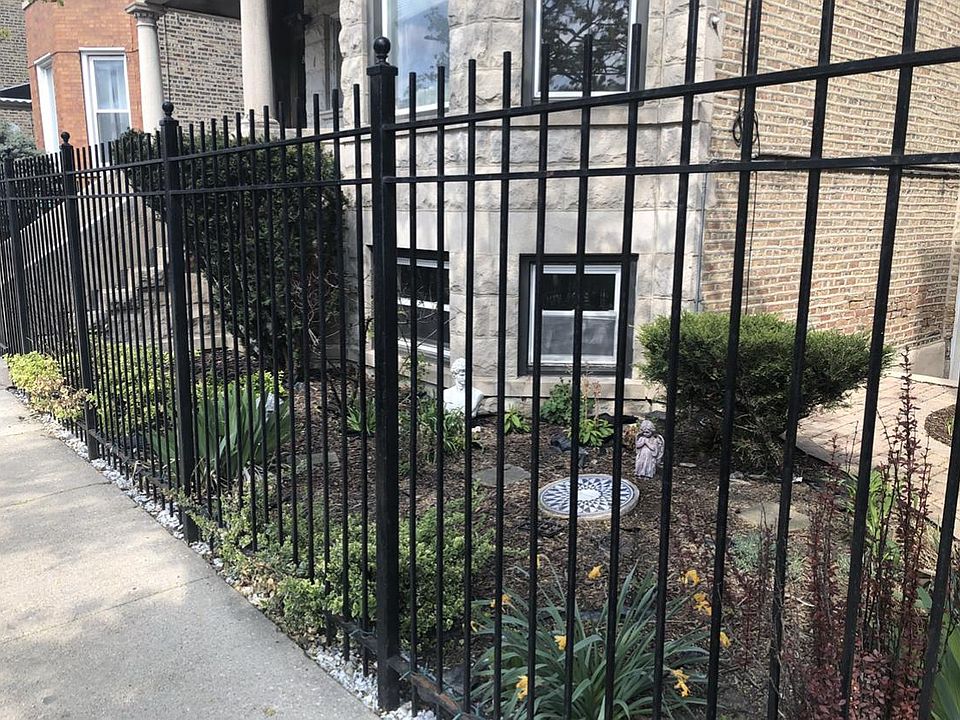 Front gate (garden apt windows visible)