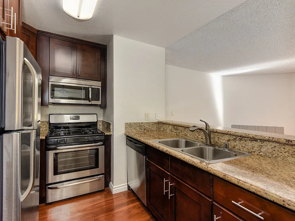 Kitchen with Countertops and Stainless Steel Appliances