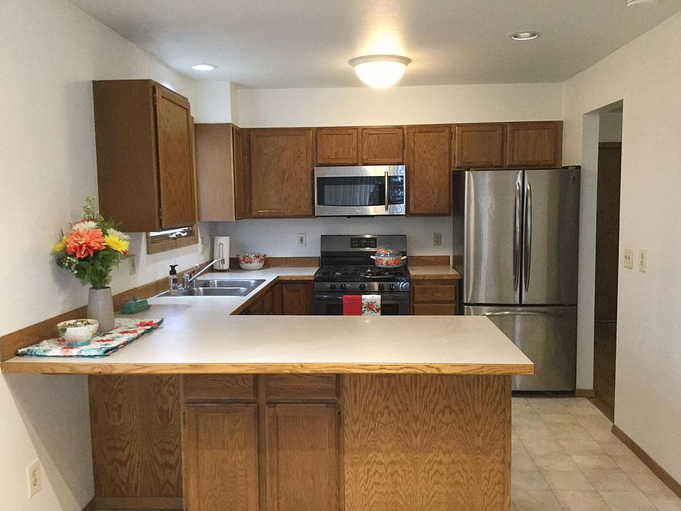 Kitchen with new range, Bosh Dishwasher, and French door refeg with freezer drawer on bottom