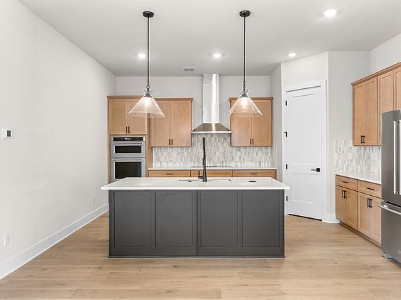 The kitchen has a convenient kitchen island.